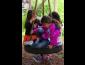 Three Children on swing