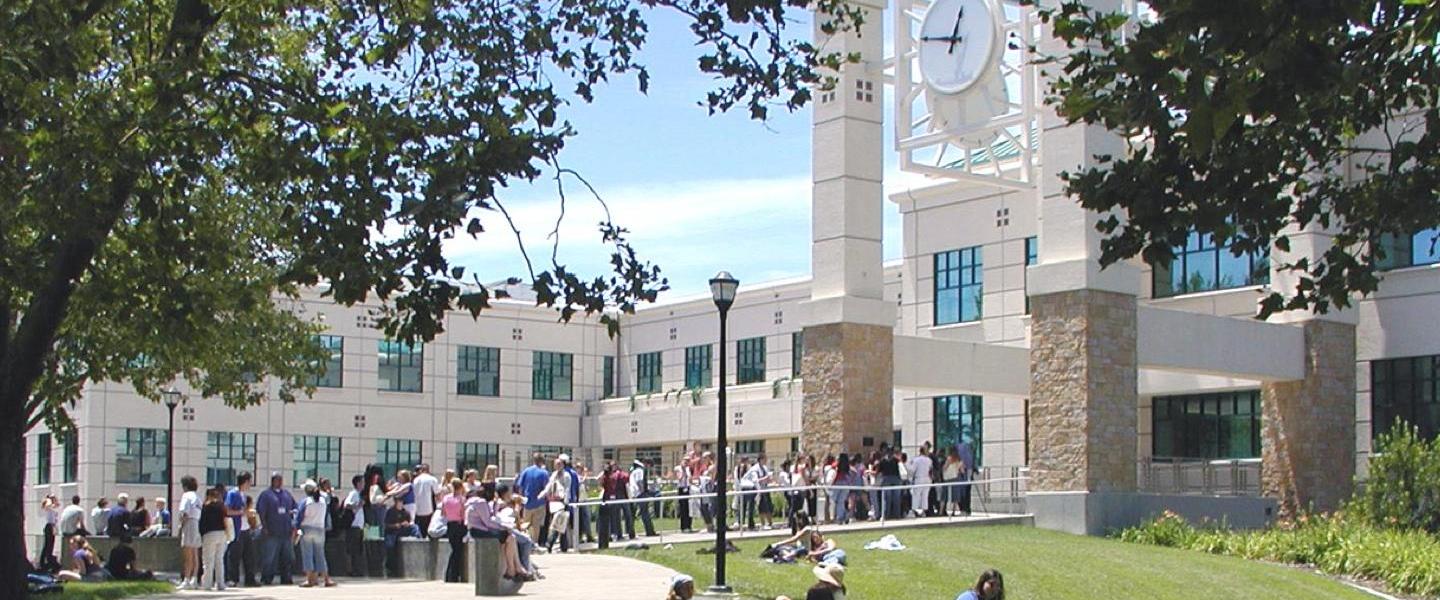 Schulz Library Building with clock and people